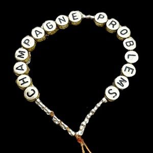 Taylor Swift homemade stretchy friendship bracelet Champagne Problems